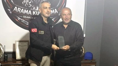 KURTARICI EKİBE VEFA PLAKETİ