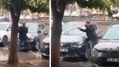 YAĞMUR FIRSATI: SOKAK ORTASINDA ARABA YIKADI