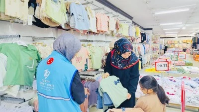 YETİM &Ccedil;OCUKLARA GİYİM YARDIMI