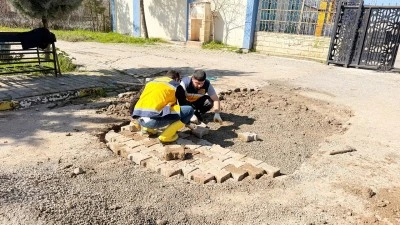 MEZARLIKLARDA YOL VE KALDIRIM ONARIMI